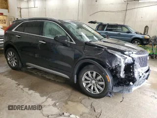 2020 Cadillac XT4 AWD Premium Luxury with VIN 1GYFZDR46LF119731, listed as a Copart auction lot 57614305 with 17,614 mi miles and Salvage title. Bid and sale history available at DreamBid. Image 4.