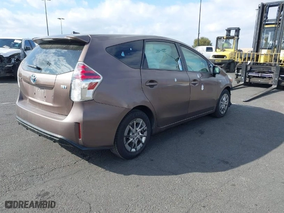 2016 Toyota Prius v Two with VIN JTDZN3EU0GJ042775, listed as a IAAI auction lot 41283162 with 220,882 mi miles. Bid and sale history available at carsss.com. Image 4.