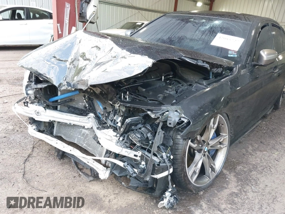 2018 BMW 5 Series M550i xDrive with VIN WBAJB9C51JB035949, listed as a IAAI auction lot 42085727 with Not provided miles and . Bid and sale history available at DreamBid. Image 6.