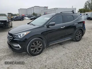 2018 Hyundai Santa Fe Ultimate z VIN 5XYZW4LA5JG513788, wystawiony jako Copart lot #42439725 z przebiegiem 56 828 mil mil oraz Nie do naprawy • Non repairable. Historia ofert i sprzedaży dostępna na DreamBid. Obrazek 1.