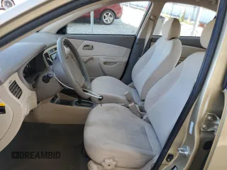 2009 Kia Rio LX with VIN KNADE223996521831, listed as a Copart auction lot 69126284 with 183,796 mi miles and Salvage Title. Bid and sale history available at DreamBid. Image 7.