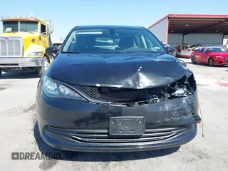 2017 Chrysler Pacifica Touring with VIN 2C4RC1DG6HR501164, listed as a IAAI auction lot 41863304 with 87,705 mi miles and . Bid and sale history available at DreamBid. Image 13.