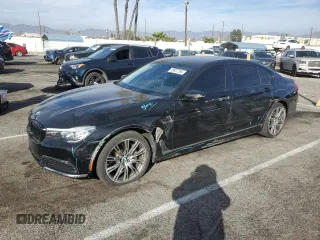 2018 BMW 7 Series 740i with VIN WBA7E2C5XJG743287, listed as a Copart auction lot 43837185 with 83,130 mi miles and Salvage Title. Bid and sale history available at carsss.com. Image 1.