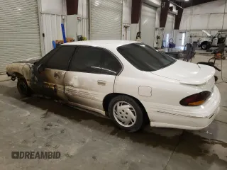 1997 Pontiac Bonneville SE z VIN 1G2HX52K7VH231291, wystawiony jako Copart lot #57514725 z przebiegiem Nie podano mil oraz Nie do naprawy. Historia ofert i sprzedaży dostępna na DreamBid. Obrazek 2.