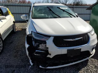 2021 Chrysler Pacifica Touring L with VIN 2C4RC1BGXMR532883, listed as a Copart auction lot 50173485 with 154,431 mi miles and Salvage Title. Bid and sale history available at DreamBid. Image 5.