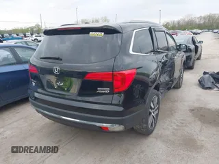 2017 Honda Pilot Touring with VIN 5FNYF6H93HB028122, listed as a IAAI auction lot 42130116 with 109,318 mi miles and . Bid and sale history available at DreamBid. Image 4.