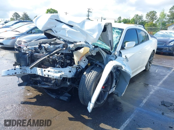 2019 Dodge Charger Scat Pack with VIN 2C3CDXGJ3KH558856, listed as a IAAI auction lot 42009847 with 62,546 mi miles and . Bid and sale history available at DreamBid. Image 2.