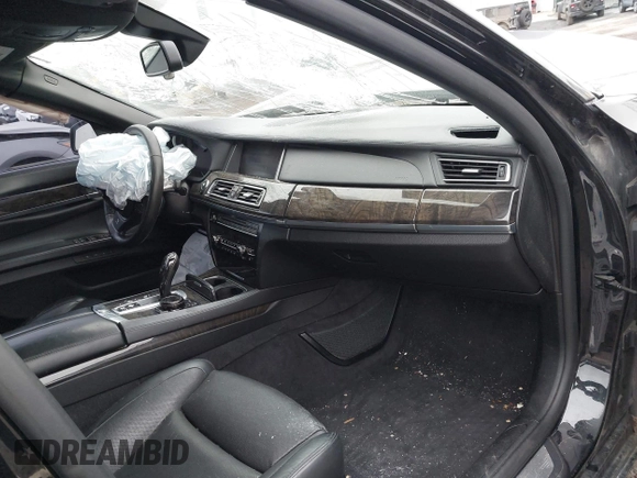 2015 BMW 7 Series 750i xDrive with VIN WBAYB6C59FD965820, listed as a IAAI auction lot 41558215 with 142,617 mi miles. Bid and sale history available at carsss.com. Image 5.