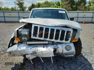 2007 Jeep Commander Sport z VIN 1J8HG48P47C691235, wystawiony jako Copart lot #64057505 z przebiegiem 135 641 mil mil oraz Szkoda całkowita • Salvage title. Historia ofert i sprzedaży dostępna na DreamBid. Obrazek 5.