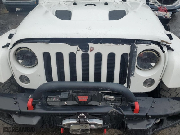 2015 Jeep Wrangler Unlimited Rubicon Hard Rock with VIN 1C4HJWFG8FL647910, listed as a Copart auction lot 46716605 with 48,139 mi miles and Salvage Title. Bid and sale history available at carsss.com. Image 11.