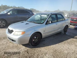 2001 Mazda Protege DX with VIN JM1BJ222210417508, listed as a Copart auction lot 83482064 with Not Provided miles and Salvage Title. Bid and sale history available at DreamBid. Image 1.