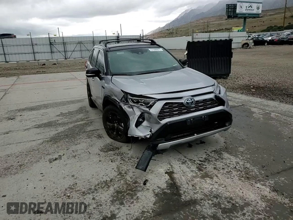 2021 Toyota RAV4 Hybrid XSE with VIN 4T3E6RFV2MU016441, listed as a Copart auction lot 57090975 with 69,304 mi miles and Salvage title. Bid and sale history available at DreamBid. Image 14.