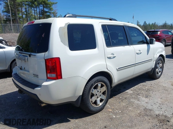 2011 Honda Pilot Touring with VIN 5FNYF4H98BB087713, listed as a IAAI auction lot 42132764 with 250,507 mi miles. Bid and sale history available at carsss.com. Image 4.