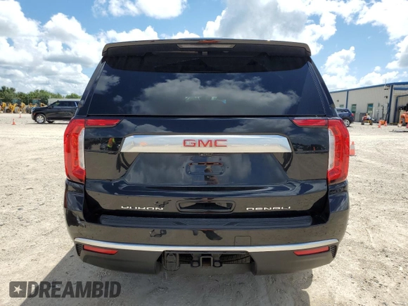 2023 GMC Yukon XL Denali with VIN 1GKS2JKT2PR438920, listed as a Copart auction lot 69749244 with 23,817 mi miles and Salvage Title. Bid and sale history available at DreamBid. Image 6.
