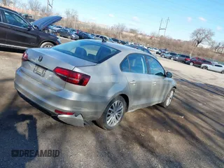 2016 Volkswagen Jetta Sedan 1.8T SEL with VIN 3VWL07AJ0GM313695, listed as a IAAI auction lot 41523515 with 94,212 mi miles. Bid and sale history available at carsss.com. Image 4.
