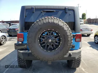 2015 Jeep Wrangler Unlimited Rubicon с VIN 1C4BJWFG9FL591529, выставлен на аукционе Copart как лот 58721265 с пробегом 110 373 миль миль и Чистый • Clean title. История ставок и продаж доступна на DreamBid. Изображение 6.