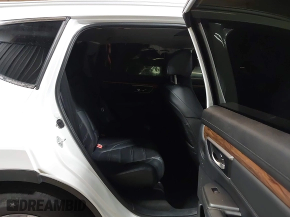 2021 Honda CR-V Touring with VIN 7FART6H98ME024238, listed as a IAAI auction lot 42341911 with 50,757 mi miles and . Bid and sale history available at DreamBid. Image 8.