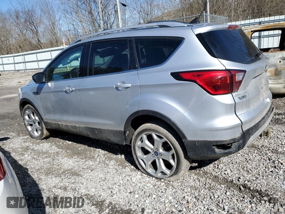 2019 Ford Escape Titanium with VIN 1FMCU9J98KUB53669, listed as a Copart auction lot 47344715 with 84,051 mi miles and Salvage title. Bid and sale history available at DreamBid. Image 2.