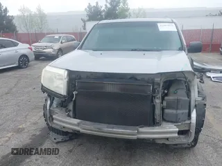 2015 Honda Pilot LX with VIN 5FNYF3H21FB010426, listed as a IAAI auction lot 41901870 with 184,113 mi miles and . Bid and sale history available at carsss.com. Image 13.
