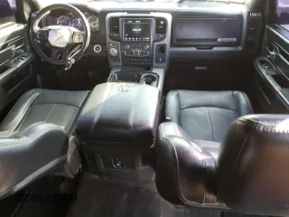 2018 Ram 1500 Rebel z VIN 1C6RR7YT1JS161619, wystawiony jako Copart lot #58272215 z przebiegiem 49 567 mil mil oraz Szkoda całkowita • Salvage title. Historia ofert i sprzedaży dostępna na DreamBid. Obrazek 8.