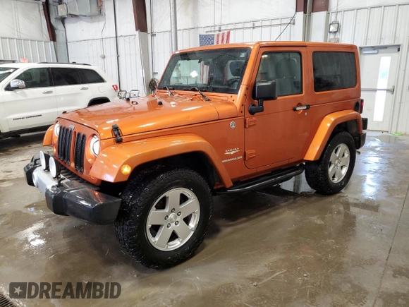 2011 Jeep Wrangler Sahara with VIN 1J4GA5D1XBL557392, listed as a Copart auction lot 56892835 with 109,567 mi miles and Clean title. Bid and sale history available at DreamBid. Image 1.
