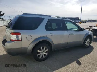 2008 Ford Taurus X SEL with VIN 1FMDK02W28GA05793, listed as a Copart auction lot 52317125 with 158,271 mi miles and Salvage title. Bid and sale history available at DreamBid. Image 3.