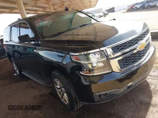 2015 Chevrolet Tahoe Commercial z VIN 1GNLC2EC0FR629983, wystawiony jako IAAI lot #41917584 z przebiegiem 111 461 mil mil oraz . Historia ofert i sprzedaży dostępna na DreamBid. Obrazek 1.