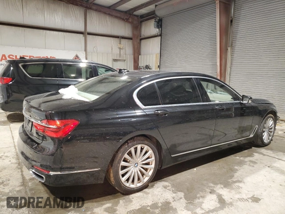 2017 BMW 7 Series 740i with VIN WBA7E2C3XHG741046, listed as a Copart auction lot 45382705 with 99,065 mi miles and Salvage Title. Bid and sale history available at carsss.com. Image 3.