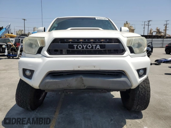 2014 Toyota Tacoma PreRunner with VIN 3TMKU4HN8EM041212, listed as a Copart auction lot 61948125 with 83,601 mi miles and Salvage title. Bid and sale history available at DreamBid. Image 5.