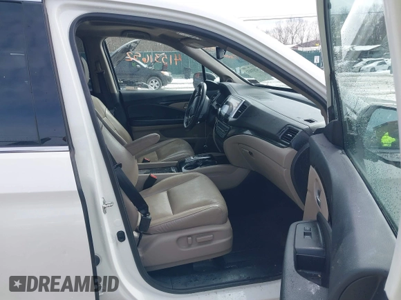 2017 Honda Pilot Touring with VIN 5FNYF6H95HB094641, listed as a IAAI auction lot 41531652 with 97,615 mi miles. Bid and sale history available at carsss.com. Image 5.