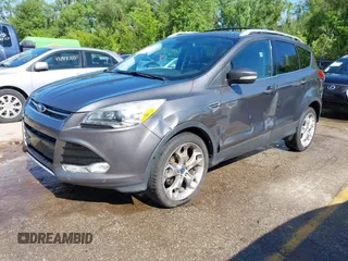 2013 Ford Escape Titanium z VIN 1FMCU0J95DUB46340, wystawiony jako IAAI lot #42168222 z przebiegiem 108 268 mil mil oraz . Historia ofert i sprzedaży dostępna na DreamBid. Obrazek 18.