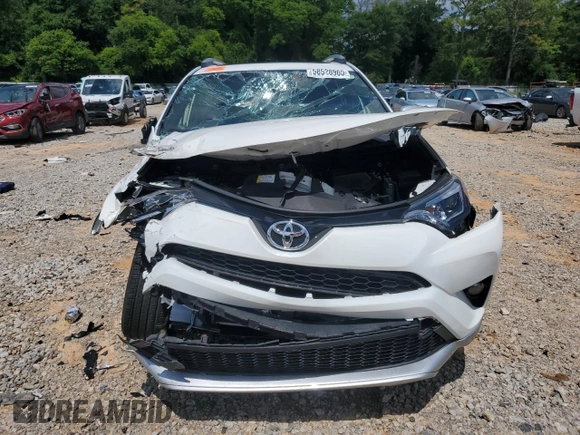2016 Toyota RAV4 SE with VIN JTMNFREVXGD086661, listed as a Copart auction lot 58528965 with 70,523 mi miles and Salvage title. Bid and sale history available at DreamBid. Image 5.