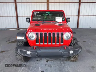 2021 Jeep Wrangler Unlimited Rubicon z VIN 1C4HJXFG8MW785318, wystawiony jako IAAI lot #42118969 z przebiegiem 61 572 mil mil oraz . Historia ofert i sprzedaży dostępna na DreamBid. Obrazek 12.