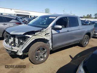 2023 Honda Ridgeline RTL-E with VIN 5FPYK3F77PB059763, listed as a Copart auction lot 54026045 with 34,114 mi miles and Salvage title. Bid and sale history available at DreamBid. Image 1.
