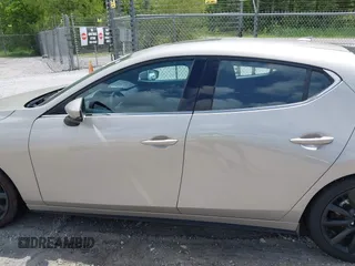 2022 Mazda Mazda3 Hatchback Premium with VIN JM1BPAML5N1507556, listed as a IAAI auction lot 42087802 with 56,507 mi miles. Bid and sale history available at carsss.com. Image 14.
