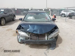 2018 Toyota Corolla L z VIN 5YFBURHE6JP840504, wystawiony jako IAAI lot #41790115 z przebiegiem 83 026 mil mil oraz . Historia ofert i sprzedaży dostępna na DreamBid. Obrazek 11.