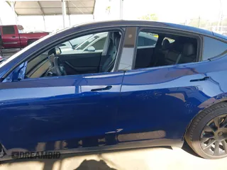 2021 Tesla Model Y Long Range z VIN 5YJYGDEE1MF296454, wystawiony jako IAAI lot #42233096 z przebiegiem 48 125 mil mil oraz . Historia ofert i sprzedaży dostępna na DreamBid. Obrazek 15.