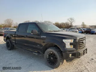 2015 Ford F-150 XLT w/HD Payload Pkg with VIN 1FTFW1EG4FKE41390, listed as a Copart auction lot 52600835 with 264,765 mi miles and Clean Title. Bid and sale history available at carsss.com. Image 4.