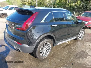 2021 Cadillac XT4 FWD Premium Luxury with VIN 1GYFZCR43MF052422, listed as a IAAI auction lot 41985859 with 25,112 mi miles. Bid and sale history available at carsss.com. Image 4.