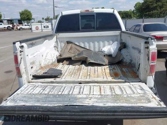 2014 Ford F-150 XL with VIN 1FTFW1CT8EKF55164, listed as a IAAI auction lot 42111483 with 233,166 mi miles. Bid and sale history available at carsss.com. Image 12.