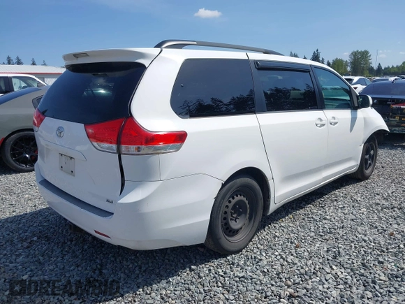 2013 Toyota Sienna XLE AAS with VIN 5TDYK3DC9DS292737, listed as a IAAI auction lot 42160582 with 200,321 mi miles and . Bid and sale history available at DreamBid. Image 4.