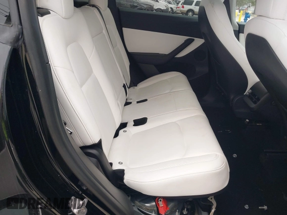 2021 Tesla Model Y Standard Range with VIN 5YJYGDED8MF123246, listed as a IAAI auction lot 41291676 with 74,630 mi miles and . Bid and sale history available at DreamBid. Image 8.