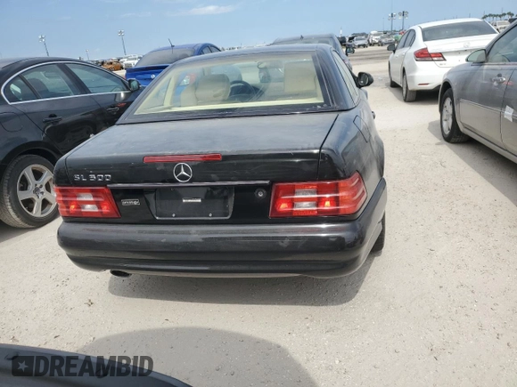 1999 Mercedes-Benz SL-Class with VIN WDBFA68F0XF177818, listed as a Copart auction lot 75025494 with 0 mi miles and Salvage Title. Bid and sale history available at carsss.com. Image 6.