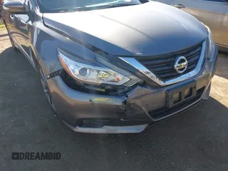 2016 Nissan Altima SV with VIN 1N4AL3AP7GC147035, listed as a IAAI auction lot 41419451 with 104,810 mi miles and . Bid and sale history available at DreamBid. Image 6.