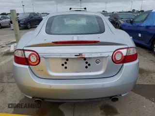 2007 Jaguar XK with VIN SAJWA43B475B12815, listed as a Copart auction lot 75012064 with 55,917 mi miles and Salvage Title. Bid and sale history available at carsss.com. Image 6.
