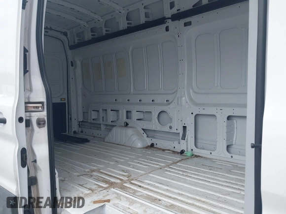 2024 Ford Transit Cargo z VIN 1FTBR3X89RKA14329, wystawiony jako IAAI lot #42483348 z przebiegiem 85 692 mil mil oraz . Historia ofert i sprzedaży dostępna na DreamBid. Obrazek 8.