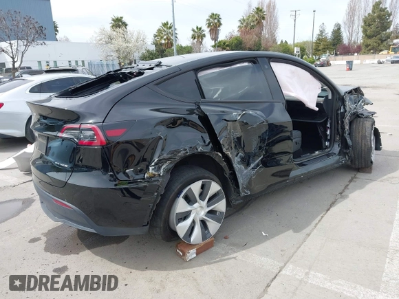 2023 Tesla Model Y Long Range with VIN 7SAYGDEE1PF748426, listed as a IAAI auction lot 41839308 with 26,633 mi miles and . Bid and sale history available at carsss.com. Image 4.