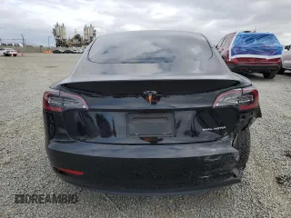 2022 Tesla Model 3 Long Range with VIN 5YJ3E1EB6NF334914, listed as a Copart auction lot 53876415 with 52,875 mi miles and Salvage Title. Bid and sale history available at carsss.com. Image 6.