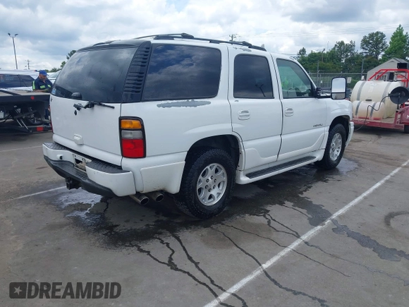 2005 GMC Yukon Denali z VIN 1GKEK63U55J259803, wystawiony jako IAAI lot #42126835 z przebiegiem 199 762 mil mil oraz . Historia ofert i sprzedaży dostępna na DreamBid. Obrazek 4.