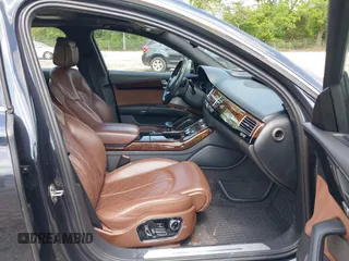 2015 Audi A8 4.0T with VIN WAU32AFD4FN002477, listed as a IAAI auction lot 42157514 with 151,729 mi miles and . Bid and sale history available at DreamBid. Image 5.